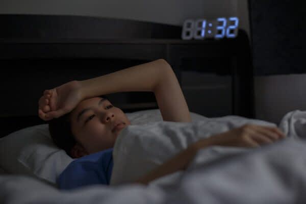 What To Do if You Can’t Sleep stock photo of a woman who can't sleep