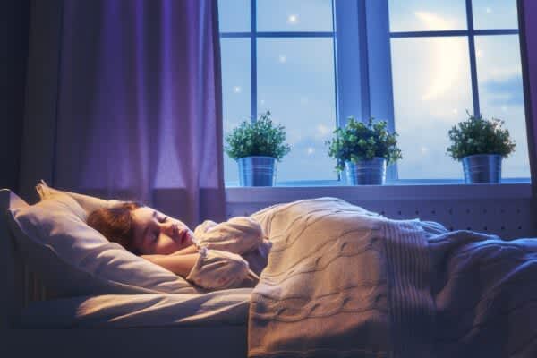 Dreams stock photo of a young girl sleeping